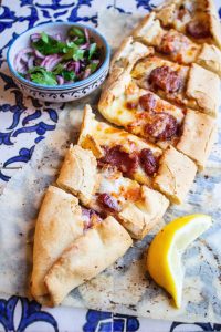 Turkish pide with sujuk and cheese